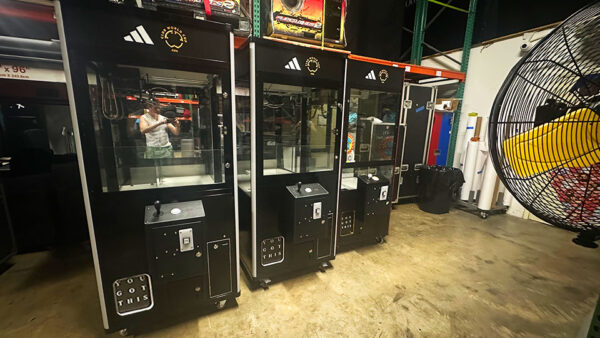 3 claw machines wrapped for Adidas Stores