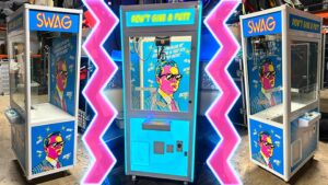 Custom branded wrapped Claw machine party rental in Naples, Florida